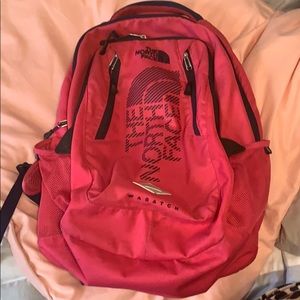 Hot pink north face book bag